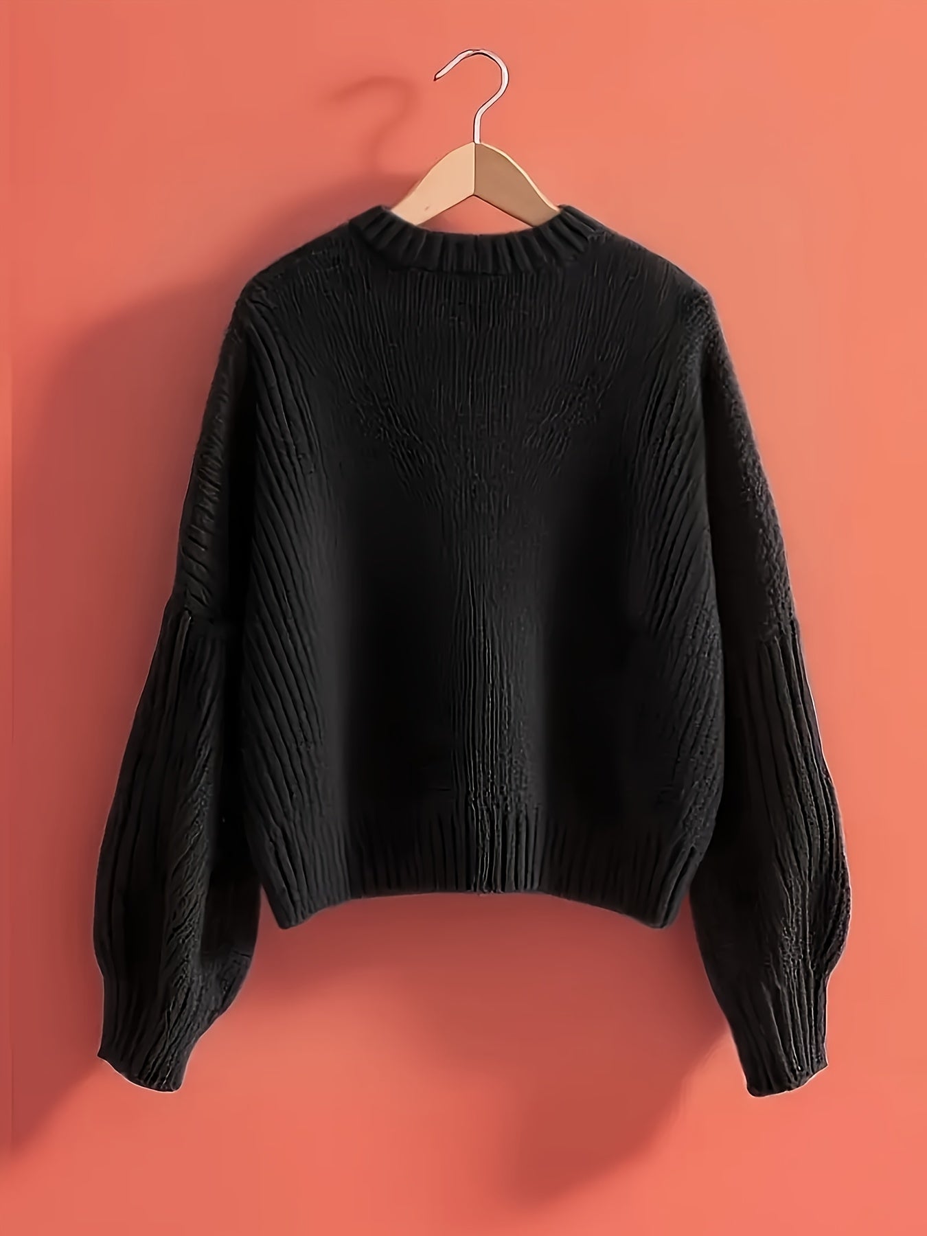 Pullover da donna in maglia grossa con scollo a V e grande fiocco