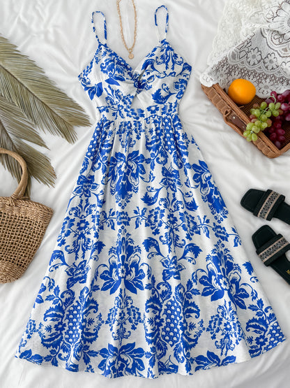 Robe midi d'été pour femme avec motif floral et découpe, tendance et féminine, idéale pour les loisirs et les vacances