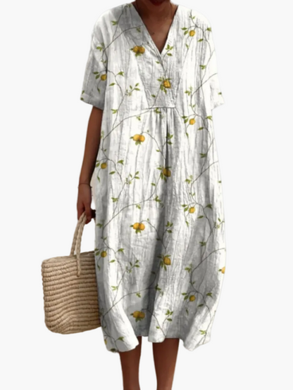 Dame sommerkjole i løs boho-stil – Fritidskjole med blomsterprint og V-udskæring, ideel til strand og hverdag