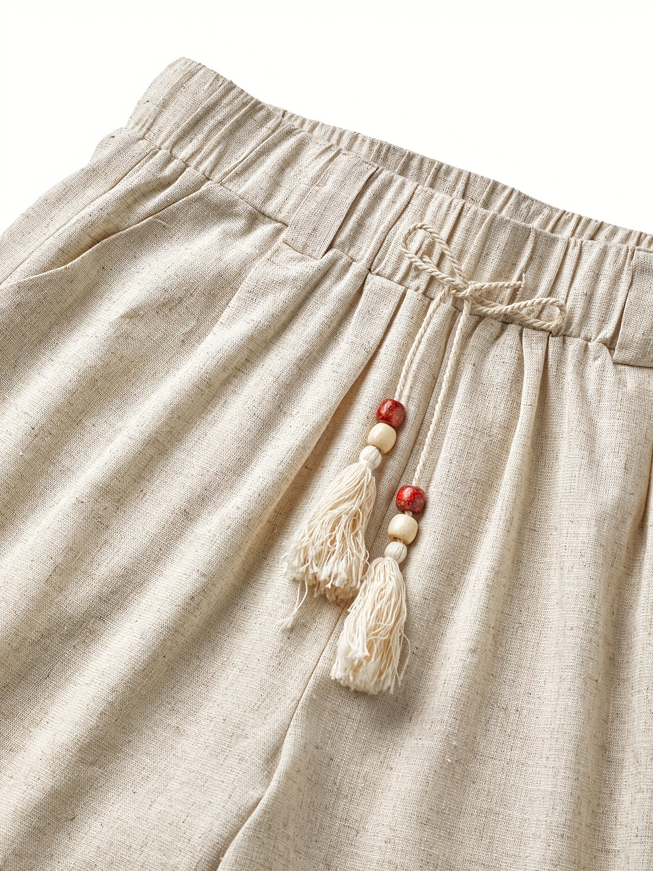 Shorts boho da uomo con coulisse e nappine per look estivi rilassati