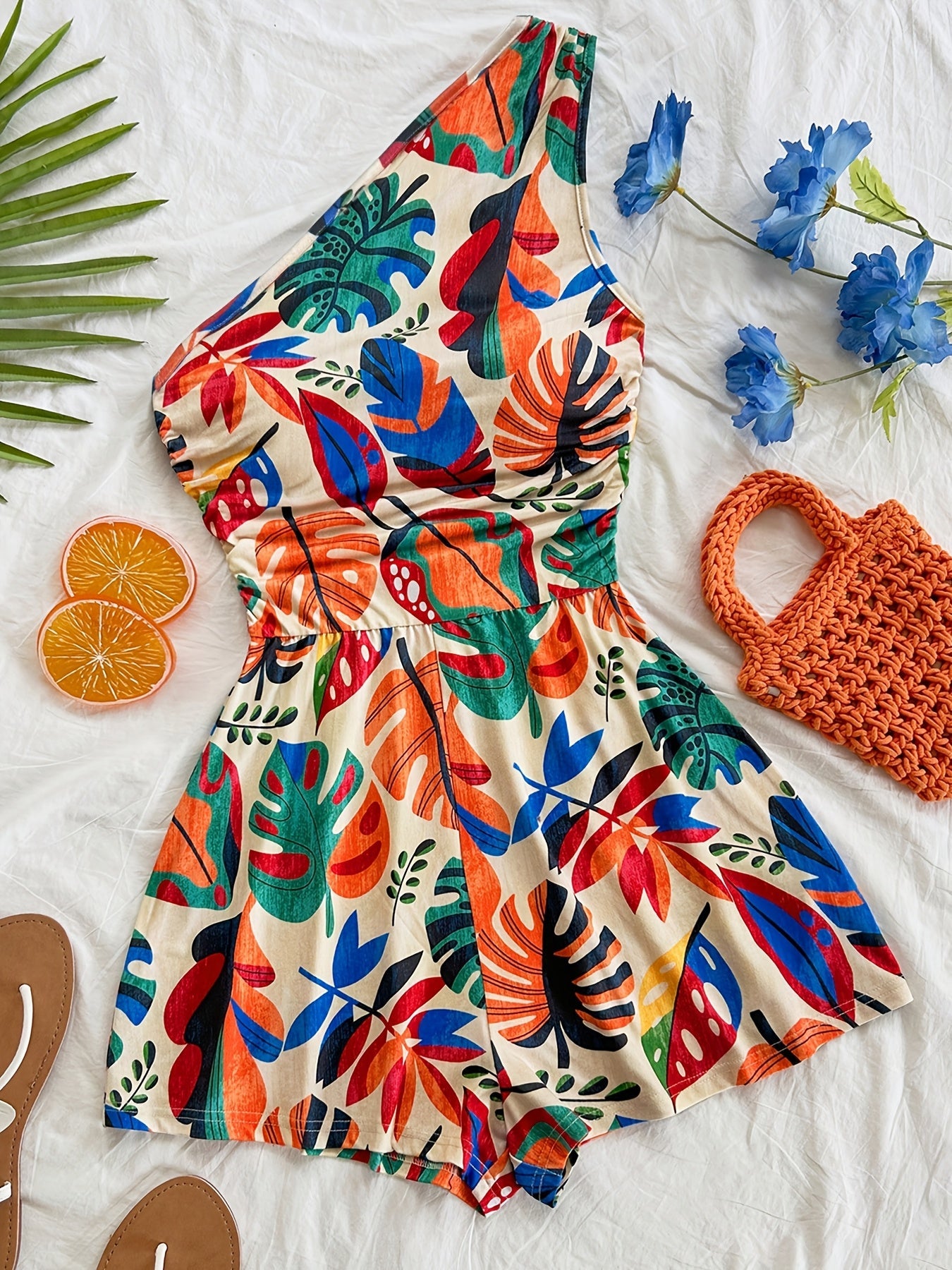 Dame ét-skulder-jumpsuit med tropisk print – sommermode til ferie og fritid