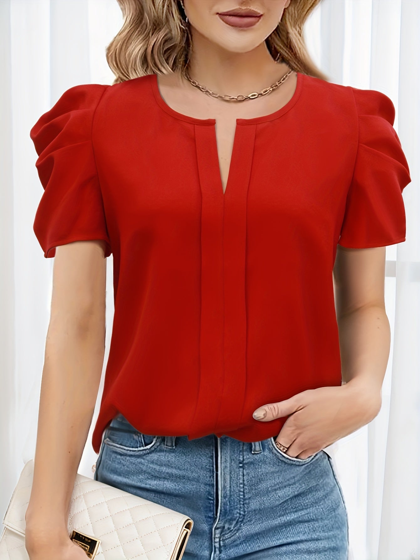Damebluse med pufferm og moderne snitt – Elegant kontor- og fritidsmote