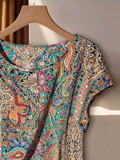 Dame sommerbluse med paisley-mønster og asymmetrisk knude – moderigtigt fritidstop