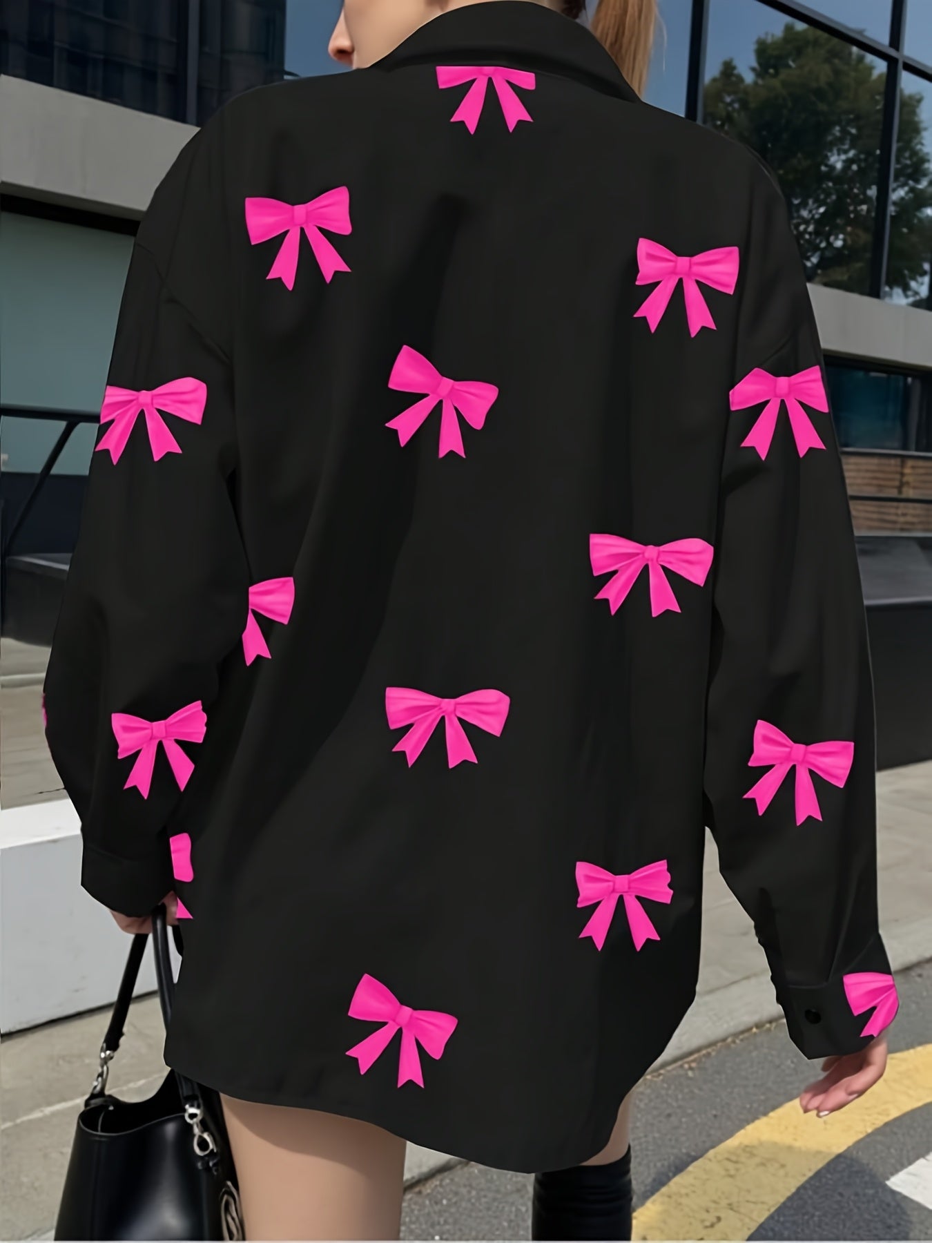 Camisa de mujer de manga larga con estampado de lazos en negro y rosa