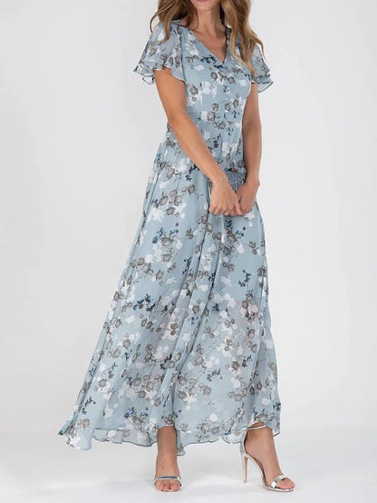 Judith – Modieuze print jurk met taille