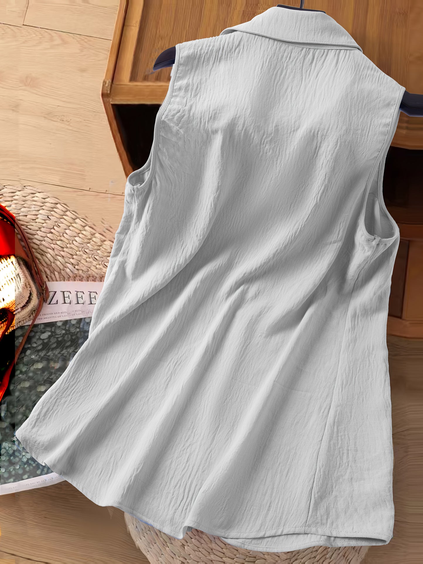 Damski top bez rękawów z kwiatową haftem – elegancki styl casualowy