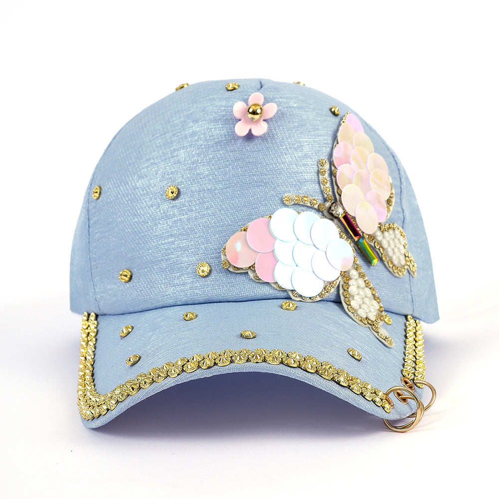 Baseballpet voor dames met vlindermotief en strassversiering