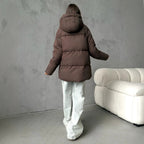 Oversized gewatteerde jas voor dames met capuchon en ingewerkte zakken