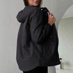 Outdoorjas voor dames met verstelbare capuchon en ruime zakken