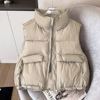 Korte gewatteerde bodywarmer voor dames met opstaande kraag en koord in de zoom