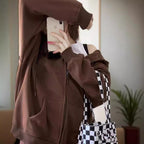 Wijde hoodie met rits voor dames, met kangoeroezakken en ribboorden