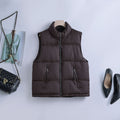 Gewatteerde bodywarmer voor dames met hoge opstaande kraag en tweewegrits