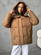 Oversized gewatteerde jas voor dames met capuchon en ingewerkte zakken