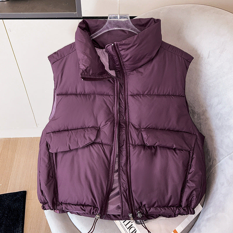 Korte gewatteerde bodywarmer voor dames met opstaande kraag en koord in de zoom