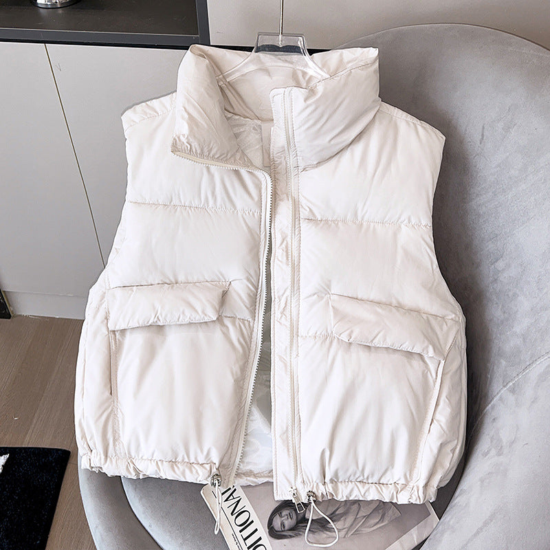 Korte gewatteerde bodywarmer voor dames met opstaande kraag en koord in de zoom