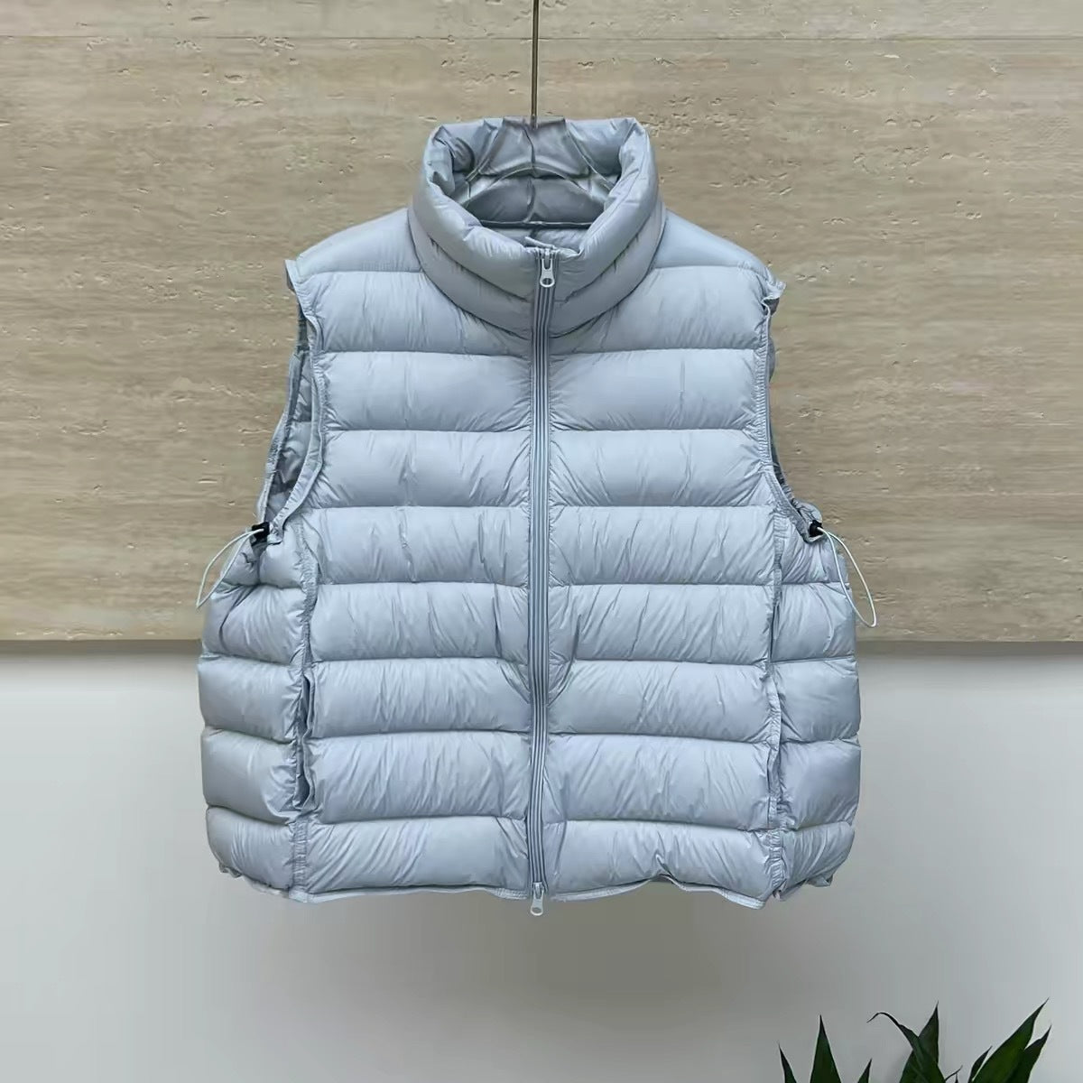 Lichte gewatteerde bodywarmer voor dames met tweewegrits