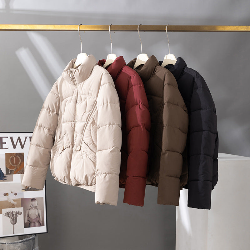 Korte gewatteerde blouson voor dames met hoge kraag en klepzakken