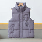 Lichte gewatteerde bodywarmer voor dames met hoge opstaande kraag en koorddetail