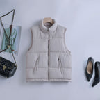 Gewatteerde bodywarmer voor dames met hoge opstaande kraag en tweewegrits