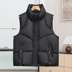 Gewatteerde bodywarmer voor dames met hoge opstaande kraag en lusjes met sierringen