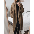Oversized mantel voor dames met revers en dubbele knopenrij