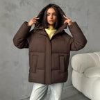 Oversized gewatteerde jas voor dames met capuchon en ingewerkte zakken