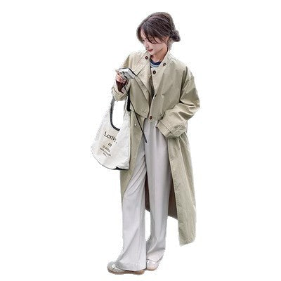 Oversized trenchcoat voor dames met cape op de rug en koord in de taille