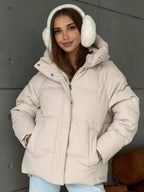 Oversized gewatteerde jas voor dames met capuchon en ingewerkte zakken