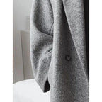 Oversized mantel voor dames met revers en dubbele knopenrij