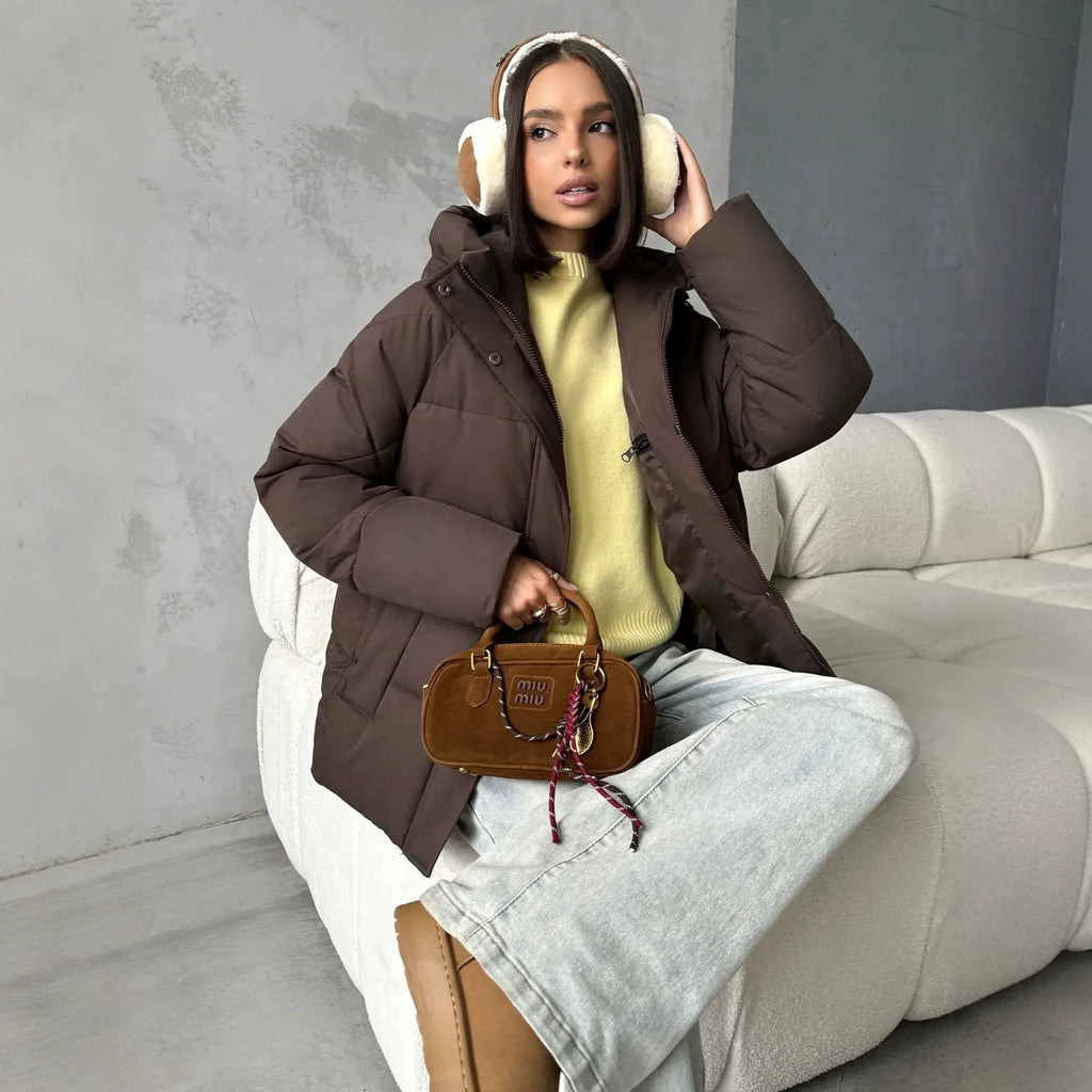 Oversized gewatteerde jas voor dames met capuchon en ingewerkte zakken