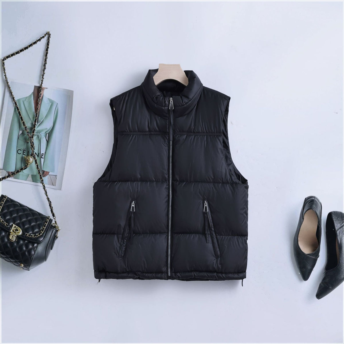 Gewatteerde bodywarmer voor dames met hoge opstaande kraag en tweewegrits