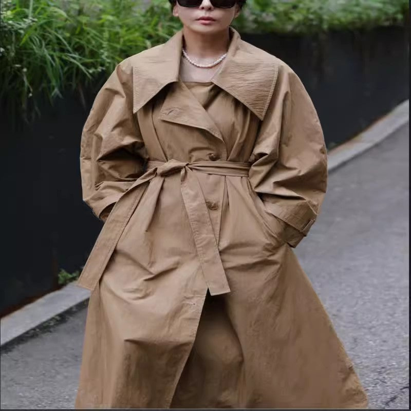 Oversized trenchcoat voor dames met watervalkraag en strikceintuur