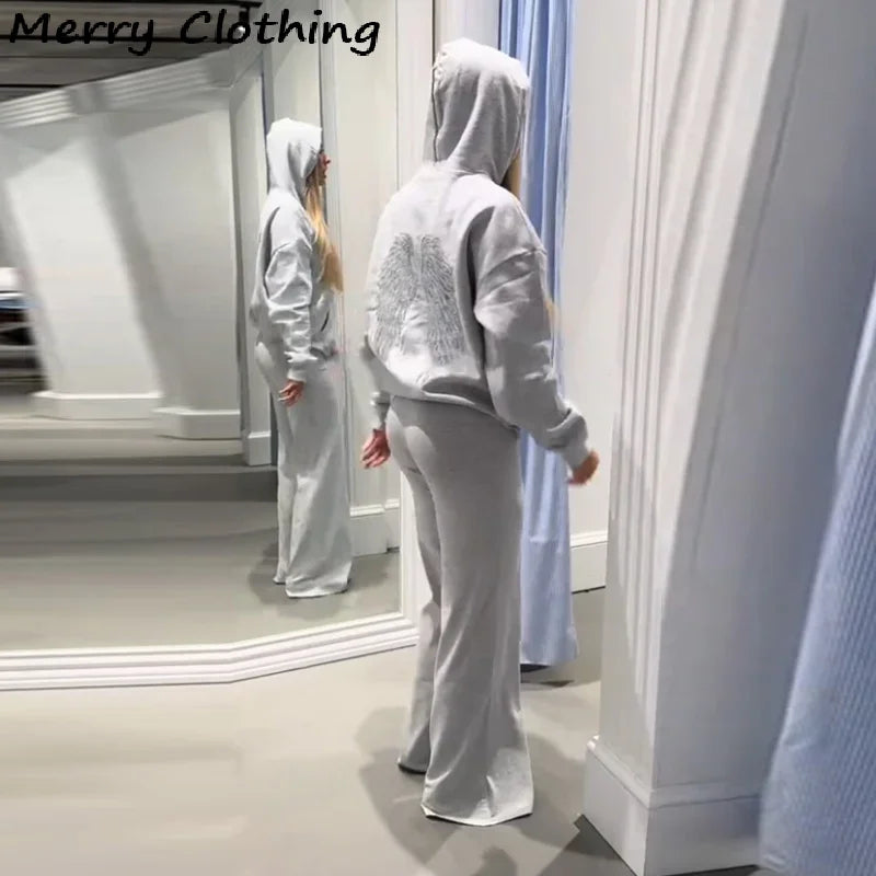 Sweat à capuche pour femme avec ailes à paillettes dans le dos
