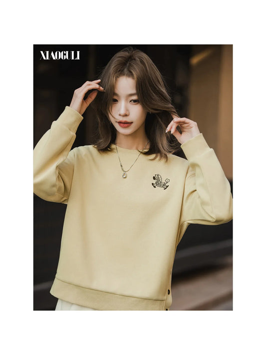 Sweat-shirt pour femme à col rond, broderie zèbre et boutons latéraux