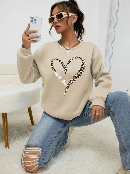 Sweat-shirt bleu pour femme avec imprimé cœur léopard, col rond et manches longues