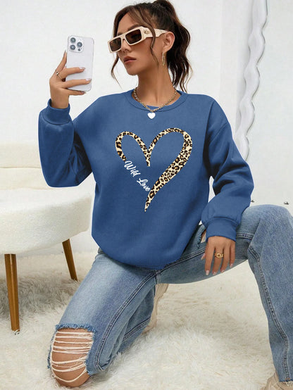 Sweat-shirt bleu pour femme avec imprimé cœur léopard, col rond et manches longues