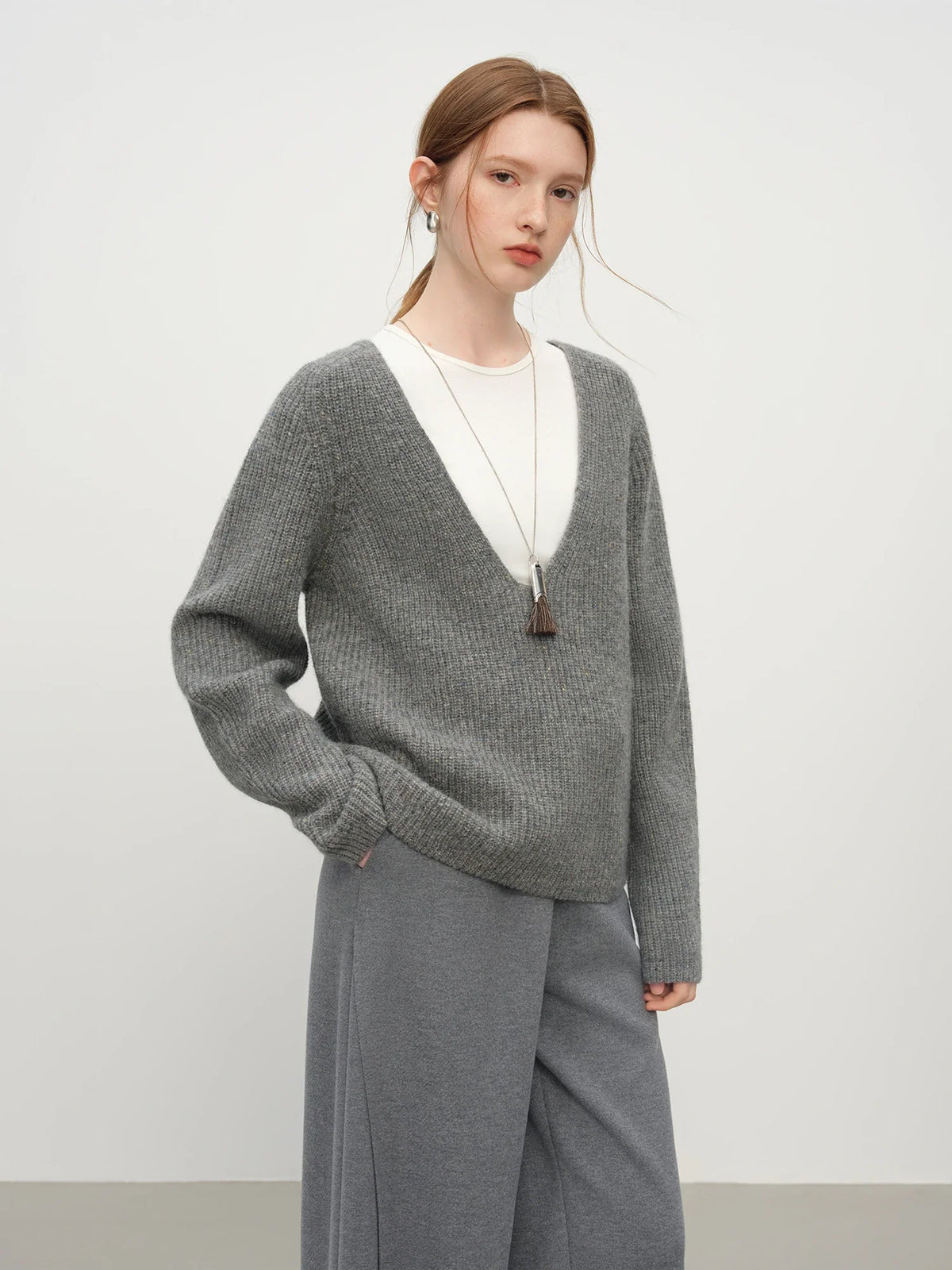 Damen Strickpullover mit tiefem V-Ausschnitt, gerippt, Langarm, meliert