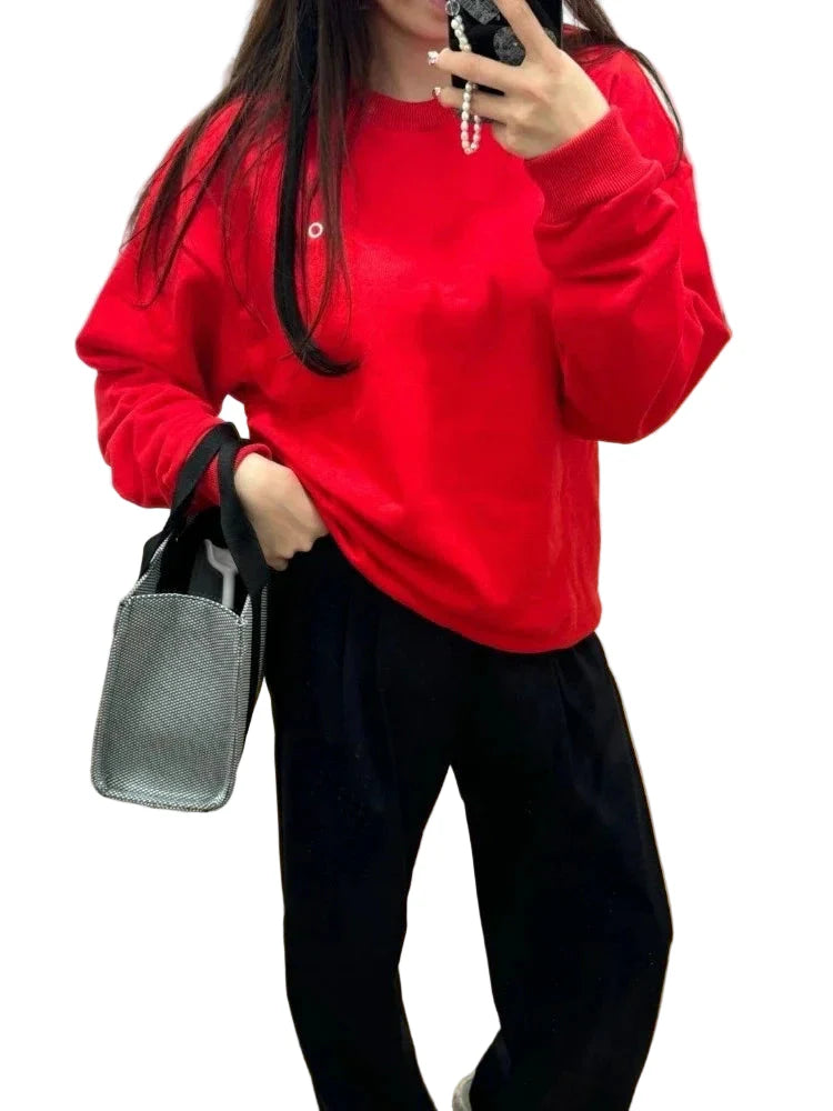Damska oversize bluza na co dzień i do sportu – swobodny look, idealny na co dzień i trening