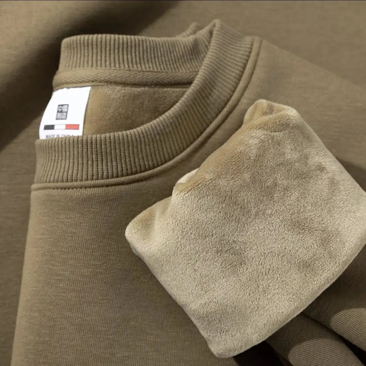 Unisex Rundhals-Sweatshirt mit Rippbündchen und weichem Innenfutter