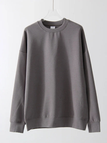 Felpa unisex oversize a maniche lunghe con scollo rotondo, tinta unita