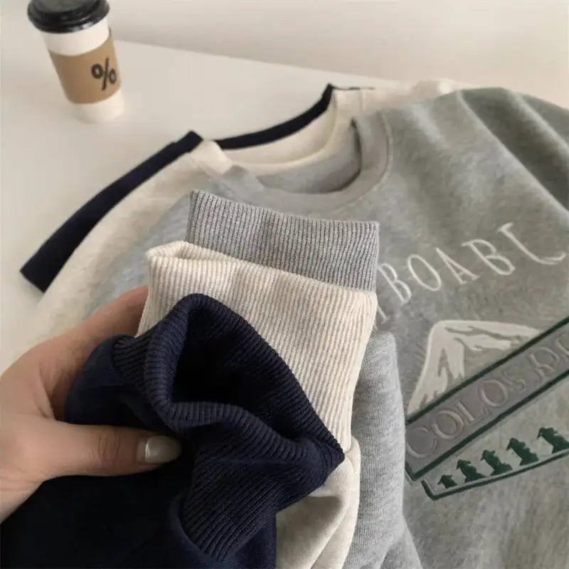 Unisex Langarm Sweatshirt mit Rundhalsausschnitt und Stickerei