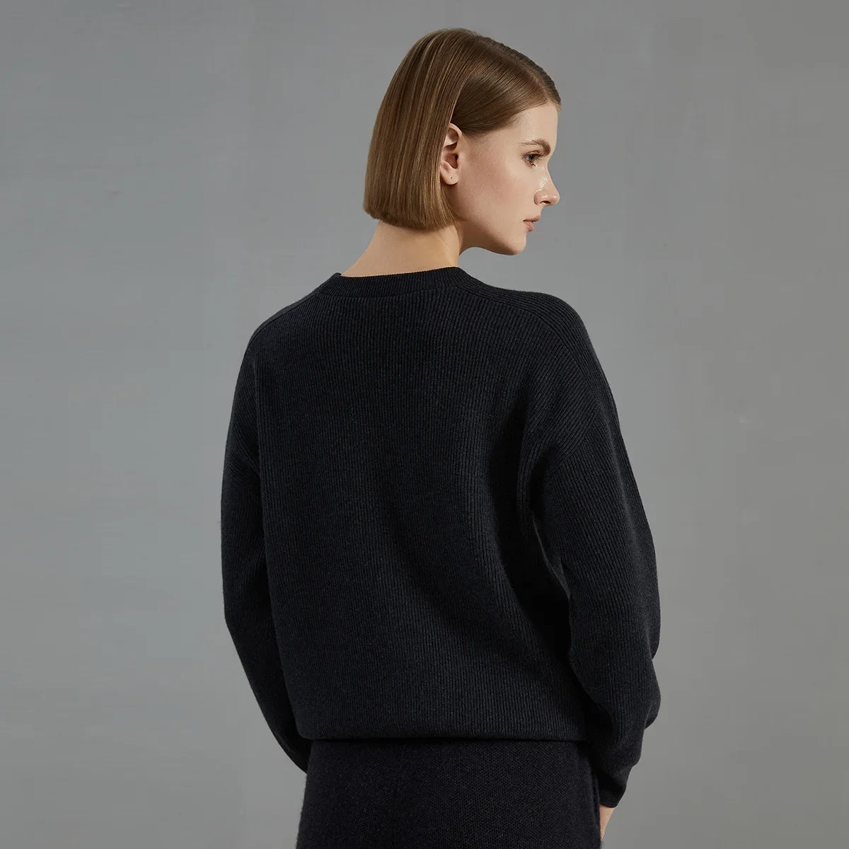 Pull pour femme à col rond, texture côtelée et couture décorative