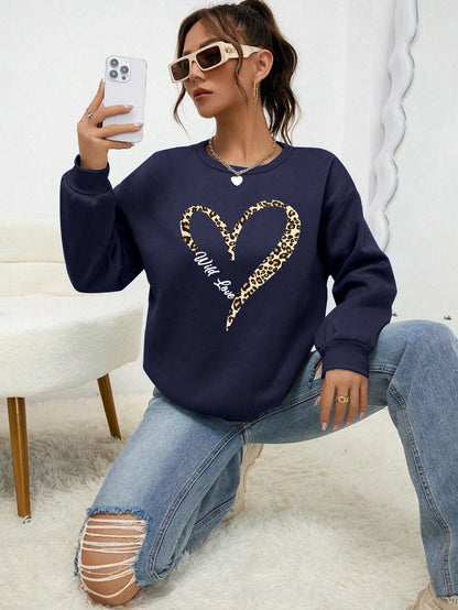Sweat-shirt bleu pour femme avec imprimé cœur léopard, col rond et manches longues
