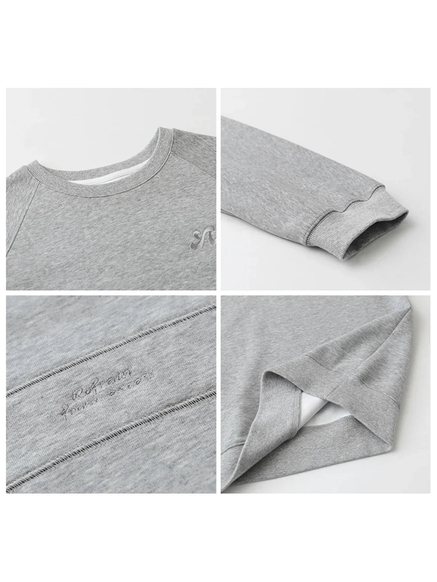 Damesweatshirt med rund hals, lange ærmer og broderet logo i turkis