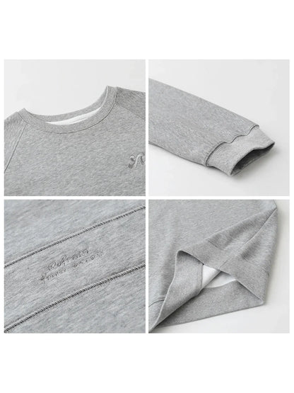 Damesweatshirt med rund hals, lange ærmer og broderet logo i turkis