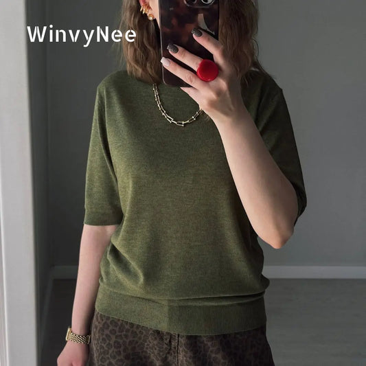 Pull en maille pour femme à manches courtes et col rond avec bordures côtelées