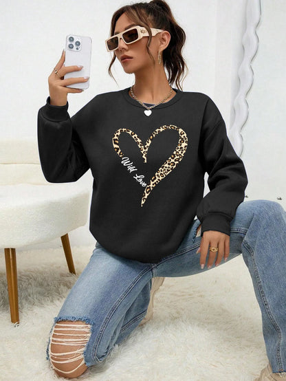 Sweat-shirt bleu pour femme avec imprimé cœur léopard, col rond et manches longues