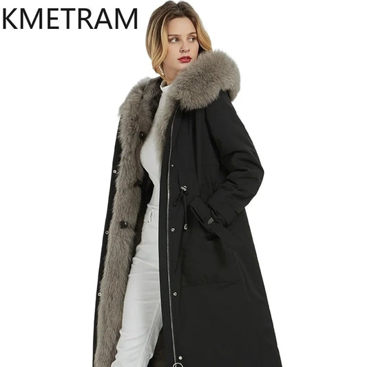 Lång svart vinterparka för damer med pälskantad huva och innerfoder