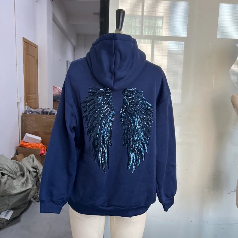 Sweat à capuche pour femme avec ailes à paillettes dans le dos