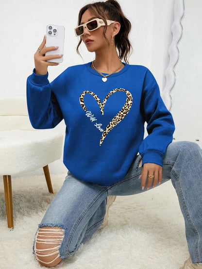 Sweat-shirt bleu pour femme avec imprimé cœur léopard, col rond et manches longues